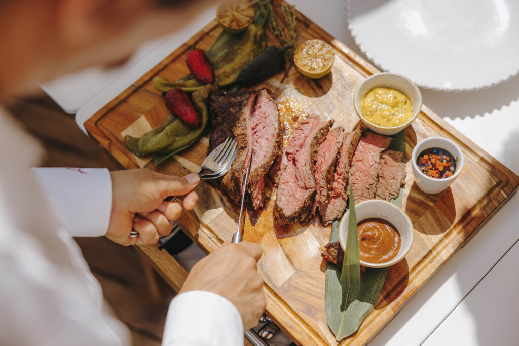 dining at a beach club in a hotel