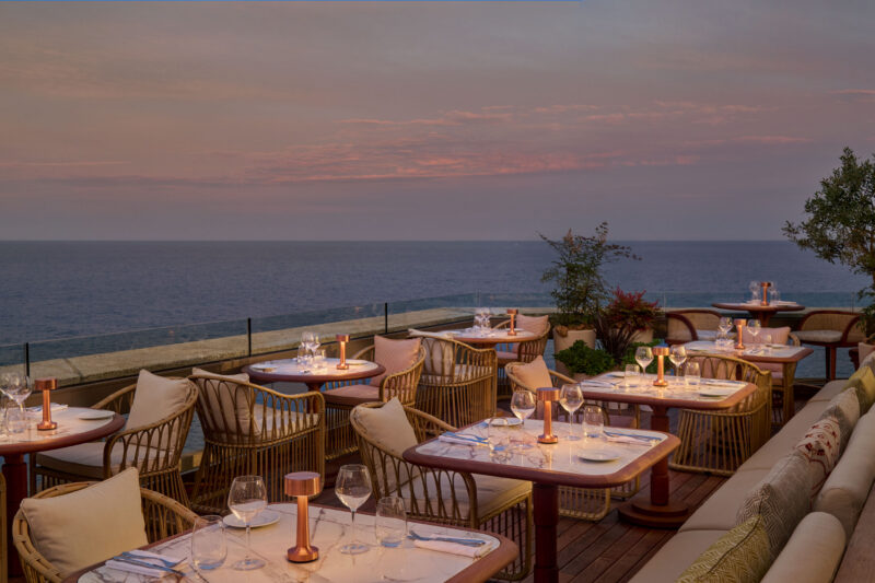 dining at a beach club in a hotel