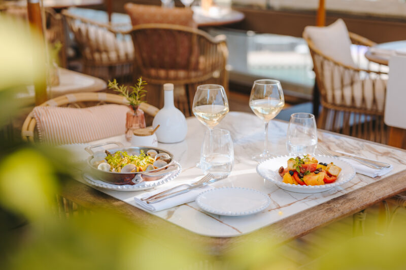 dining at a beach club in a hotel