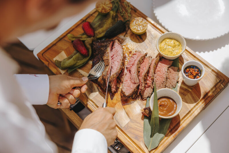 dining at a beach club in a hotel