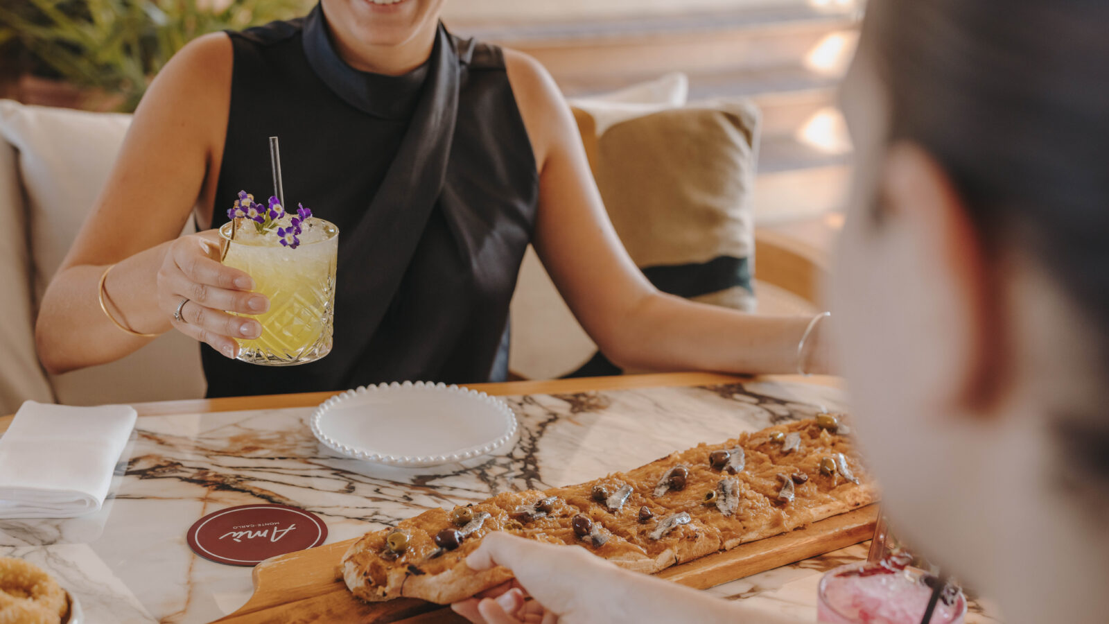 dining at a beach club in a hotel